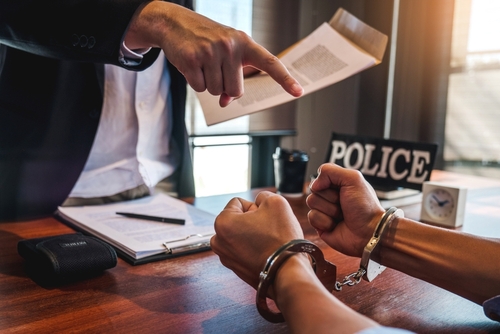 DUI probation violations, An experienced attorney presenting a defense strategy for a DUI charge, highlighting serious consequences such as jail time and probation violations.