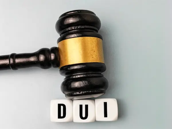 gavel and DUI block letters symbolizing an experienced DUI defense lawyer in Asheville NC.